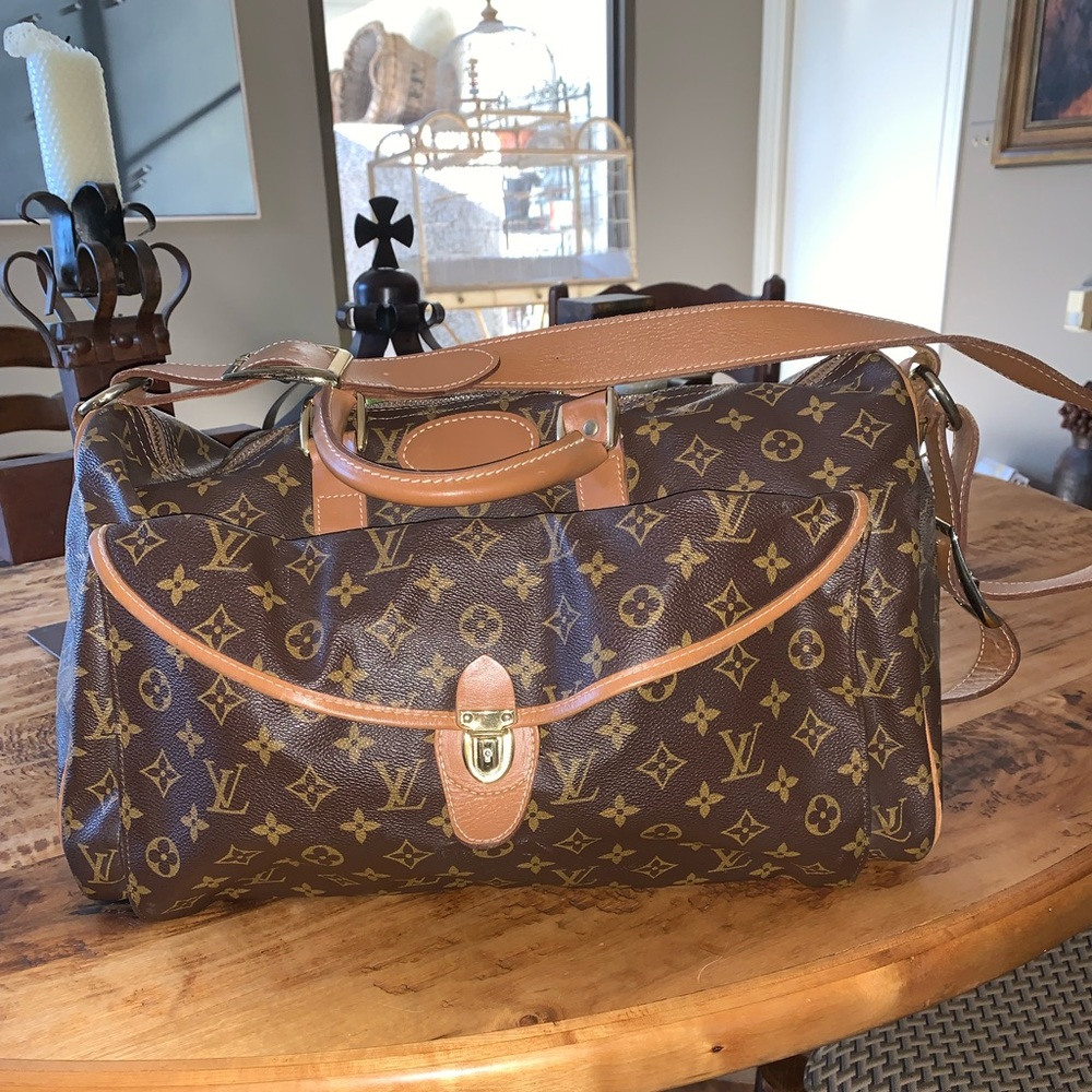 Louis Vuitton duffle bag with exterior pockets